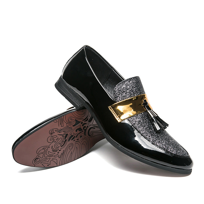 men's leather tassel shoes in black and silver with rubber sole and stylish design.