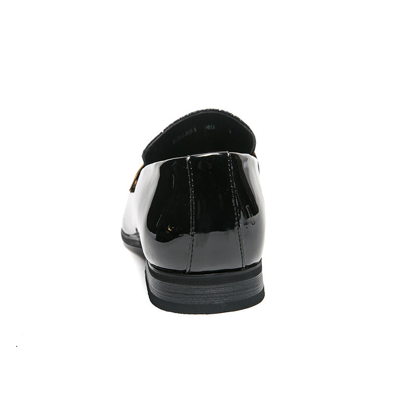 Back view of men's leather tassel shoes in shiny black, showcasing the sleek design and rubber sole.