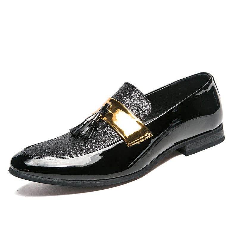 Men's leather tassel shoes in shiny black with gold accent and decorative tassels.